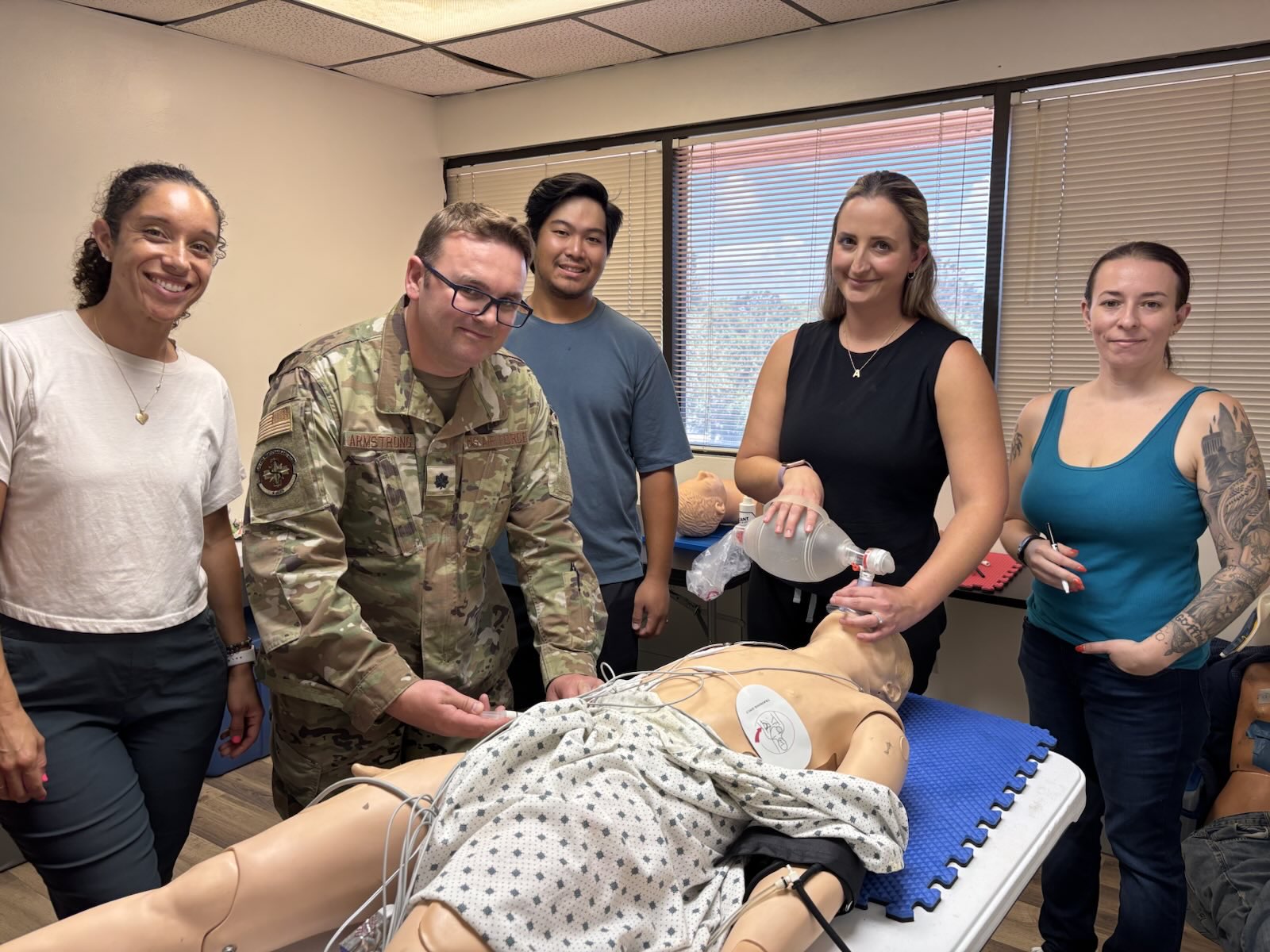 Students training together in the West Coast Florida CPR simulation lab